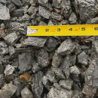 2a modifed crushed stone with tape measure showing size of stone